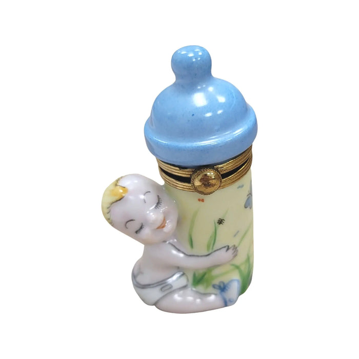 Baby With Blue Bottle Limoges box, hand-painted porcelain made in France