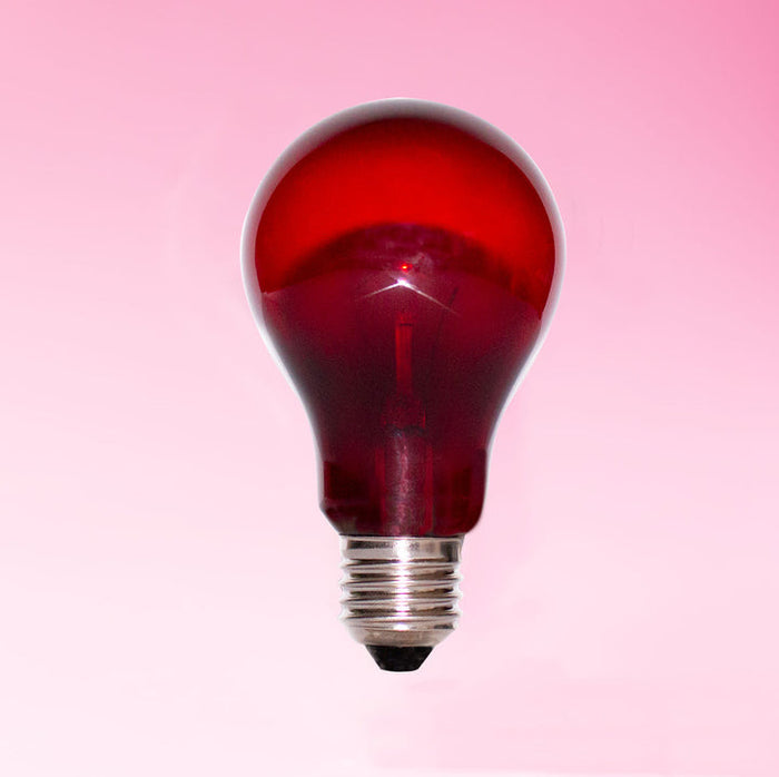 Chromalux Unwind Red Incandescent Light Bulb For Sleep displayed against a pink background.