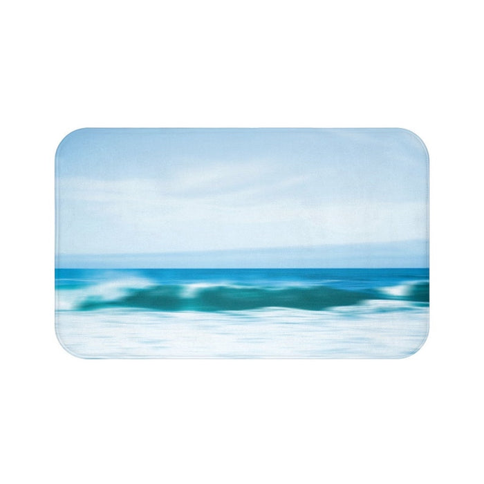 Abstract ocean wave scene with horizon and sky with clouds. Based on an actual photo and stylized to be a blurry abstract representation of the ocean. Colors include sky blue, cloud white, ocean blue, and the small, cresting wave is white and teal.
