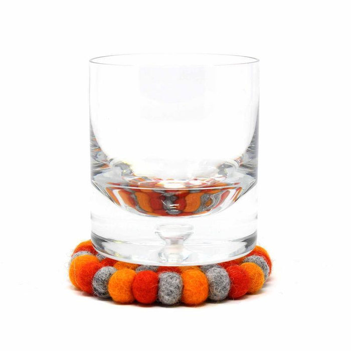Hand Crafted Felt Ball Coasters from Nepal: 4-pack, Chakra Oranges - Global Groove (T) - TheHomeToGo