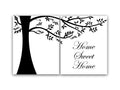 A 2-panel art print with a white background featuring a hand-drawn, black tree silhouette and the phrase 'Home Sweet Home' written on it in a black, cursive script in the lower right hand area.
