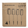 LUTEC Solar LED Pathway Lights four-pack item 1000023 in worn brown retail carton