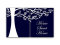 A 2-panel art print with a navy blue background featuring a hand-drawn, white tree silhouette on the left panel and the phrase 'Home Sweet Home' written in a white, cursive script on the right panel. The tree limbs and leaves connect the two panels across the top.